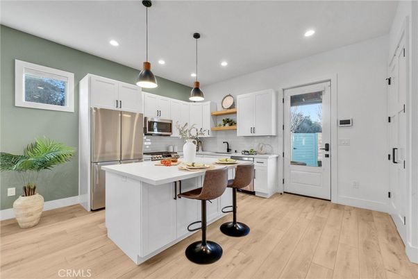 Interior, Kitchen, Pendant Lights, Recessed Lighting, Stainless Steel Appliances, Wood Texture Flooring