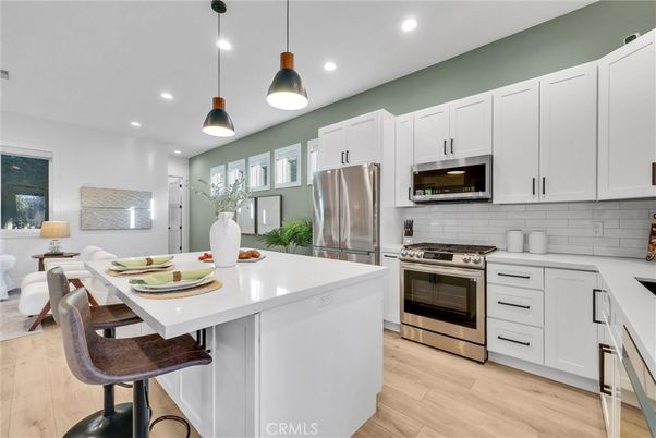Interior, Kitchen, Pendant Lights, Recessed Lighting, Stainless Steel Appliances, Wood Texture Flooring