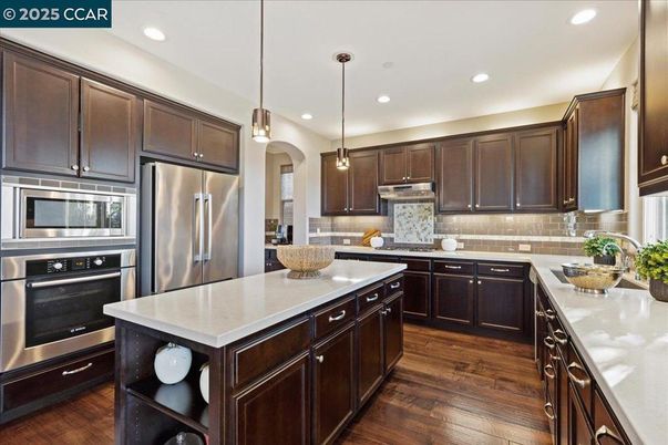 Interior, Kitchen, Pendant Lights, Recessed Lighting, Stainless Steel Appliances, Wood Texture Flooring