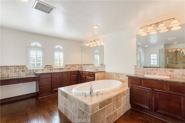 Bathroom, Dual Sink Vanities, Interior, Recessed Lighting, Wood Texture Flooring