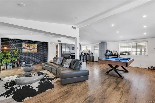 Billiard Table, Game Room, Interior, Living room, Pendant Lights, Recessed Lighting, Stone Walls, Wood Texture Flooring