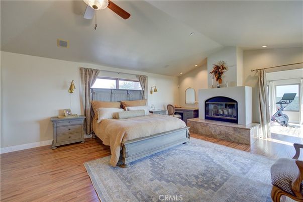 Bedroom, Fireplace, Interior, Recessed Lighting, Wood Texture Flooring