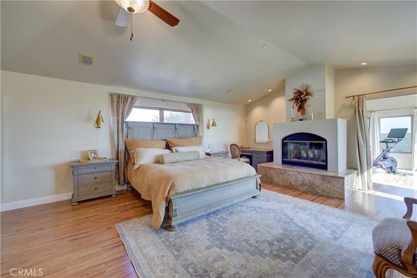 Bedroom, Fireplace, Interior, Recessed Lighting, Wood Texture Flooring