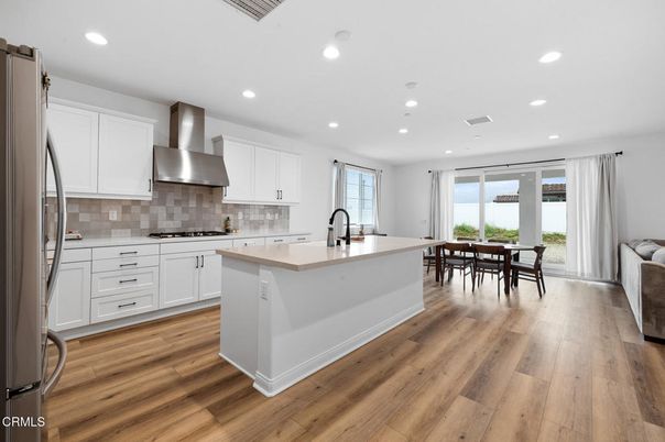 Dining room, Interior, Kitchen, Recessed Lighting, Stainless Steel Appliances, Wood Texture Flooring