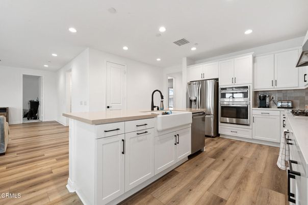 Interior, Kitchen, Recessed Lighting, Stainless Steel Appliances, Wood Texture Flooring