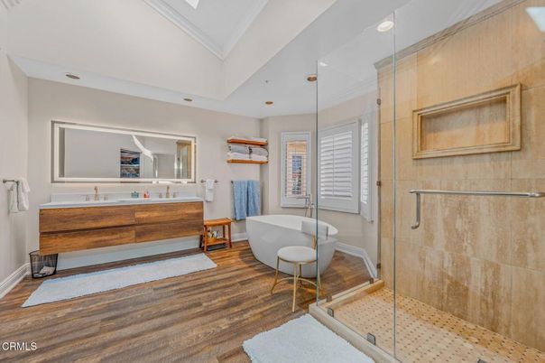 Bathroom, Free Standing Baths, Glass Shower, Interior, Recessed Lighting, Wood Texture Flooring