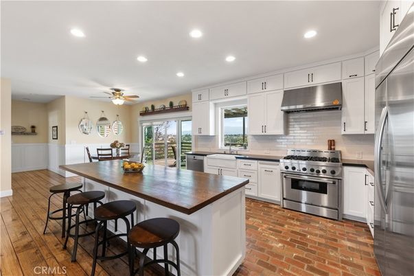 Dining room, Interior, Kitchen, Recessed Lighting, Stainless Steel Appliances, Wood Texture Flooring