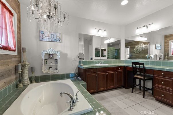 Bathroom, Chandelier, Dual Sink Vanities, Interior, Recessed Lighting, Tile Countertops