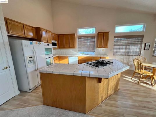 Interior, Kitchen, Tile Countertops, Wood Texture Flooring