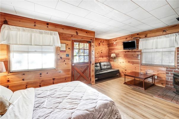 Bedroom, Fireplace, Interior, Wood Texture Flooring, Wooden Walls