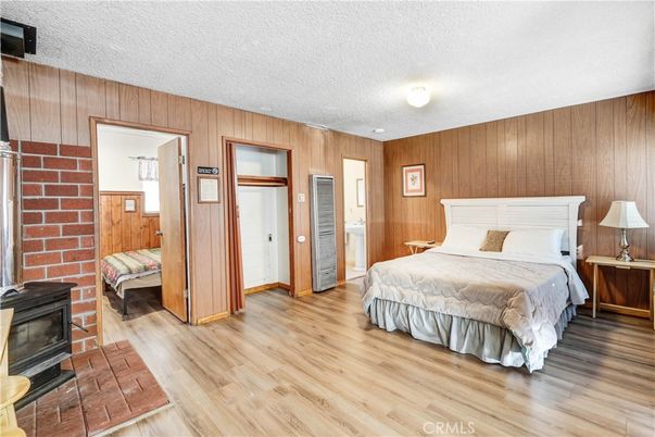 Bedroom, Fireplace, Interior, Wood Texture Flooring, Wooden Walls