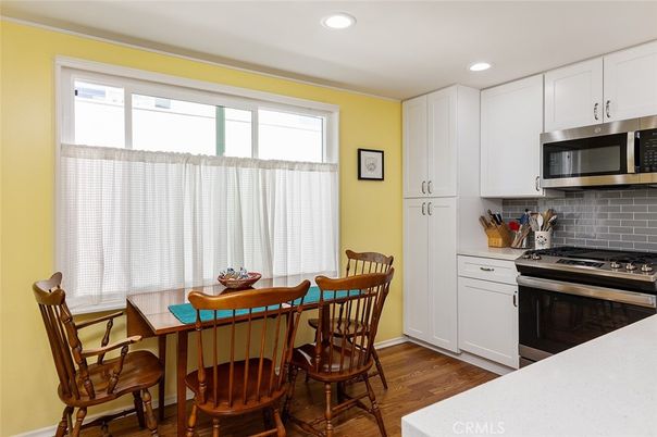 Dining room, Interior, Kitchen, Recessed Lighting, Stainless Steel Appliances, Wood Texture Flooring