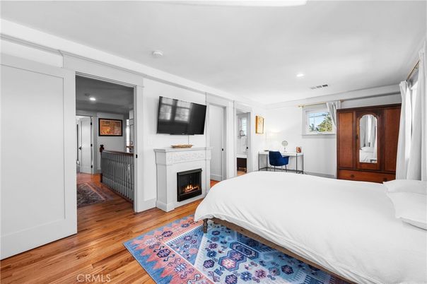 Bedroom, Fireplace, Interior, Recessed Lighting, Wood Texture Flooring