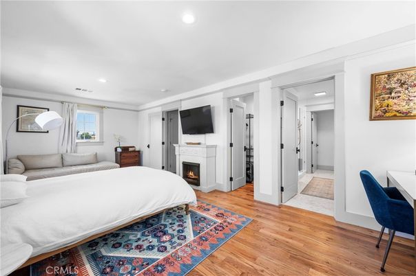 Bedroom, Fireplace, Interior, Recessed Lighting, Wood Texture Flooring