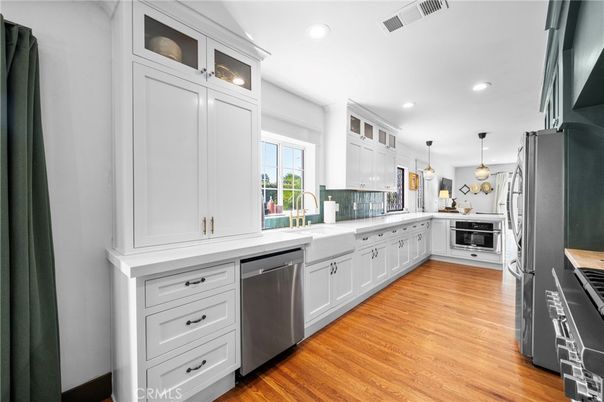 Interior, Kitchen, Pendant Lights, Recessed Lighting, Stainless Steel Appliances, Wood Texture Flooring