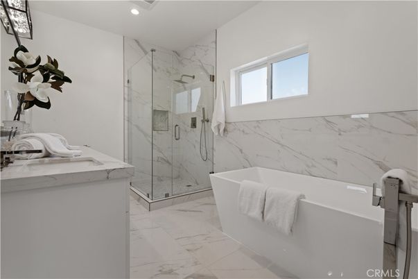 Bathroom, Free Standing Baths, Glass Shower, Interior, Marble, Marble Walls, Recessed Lighting