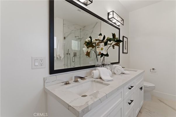 Bathroom, Dual Sink Vanities, Glass Shower, Interior, Marble, Marble Walls
