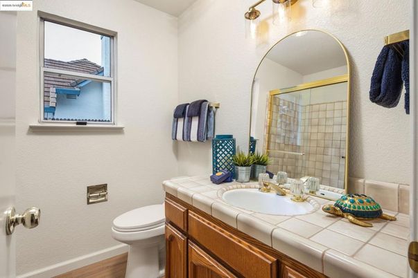 Bathroom, Glass Shower, Interior, Tile Countertops, Wood Texture Flooring