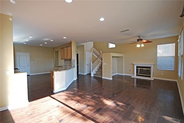 Empty room, Fireplace, Interior, Recessed Lighting, Wood Texture Flooring