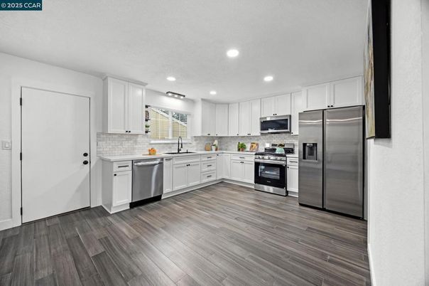 Interior, Kitchen, Recessed Lighting, Stainless Steel Appliances, Wood Texture Flooring