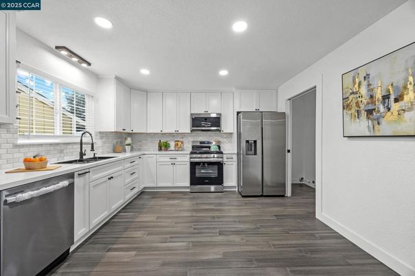 Interior, Kitchen, Recessed Lighting, Stainless Steel Appliances, Wood Texture Flooring