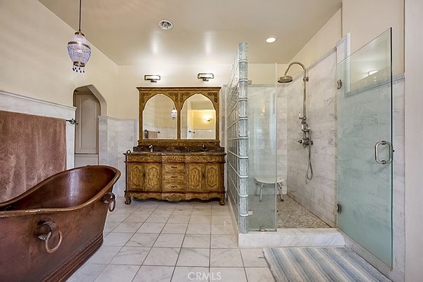 Bathroom, Dual Sink Vanities, Free Standing Baths, Glass Shower, Interior, Marble, Marble Walls, Pendant Lights, Recessed Lighting
