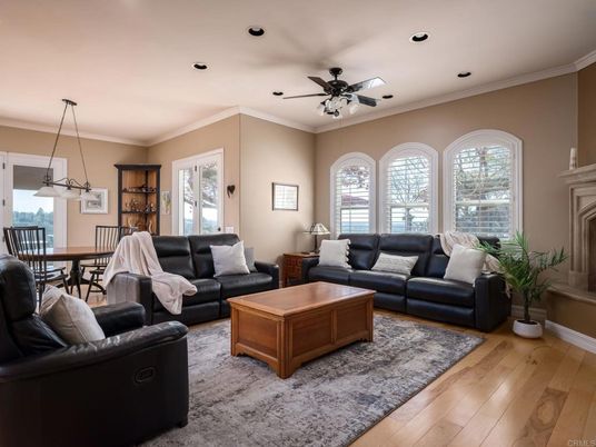 Dining room, Fireplace, Interior, Living room, Pendant Lights, Recessed Lighting, Wood Texture Flooring