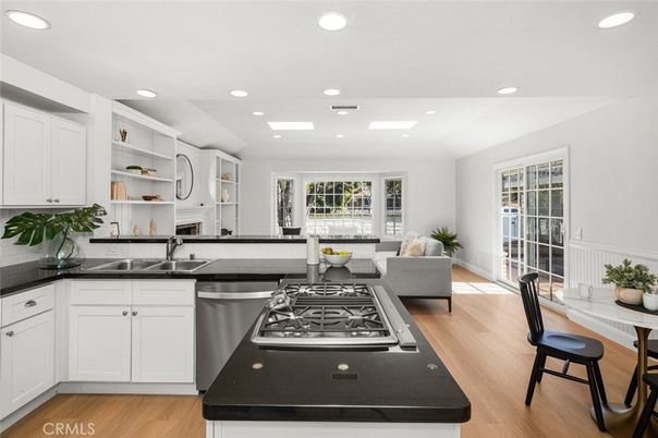 Dining room, Interior, Kitchen, Living room, Recessed Lighting, Stainless Steel Appliances, Wood Texture Flooring
