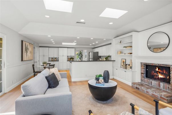 Dining room, Fireplace, Interior, Kitchen, Living room, Recessed Lighting, Wood Texture Flooring