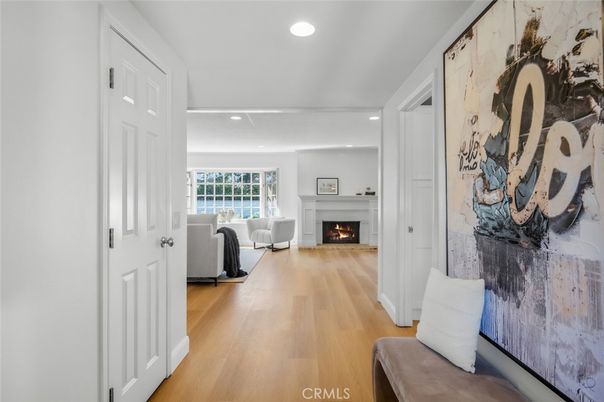 Fireplace, Interior, Living room, Recessed Lighting, Water, Wood Texture Flooring