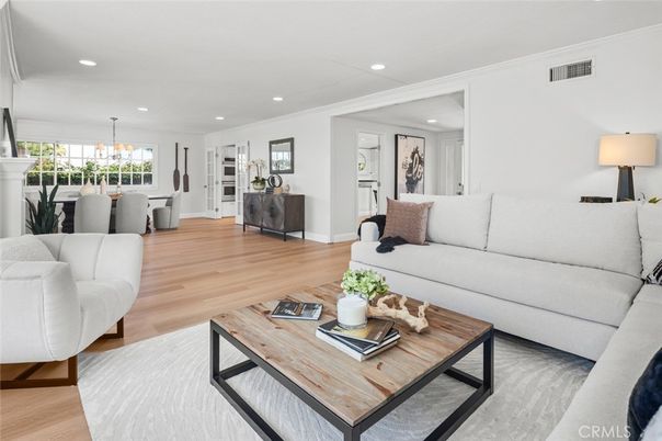 Dining room, Fireplace, Interior, Living room, Pendant Lights, Recessed Lighting, Wood Texture Flooring