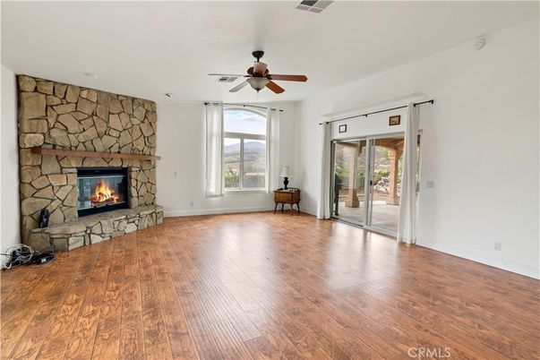 Empty room, Fireplace, Interior, Stone Walls, Wood Texture Flooring