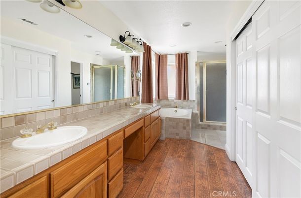 Bathroom, Dual Sink Vanities, Interior, Recessed Lighting, Tile Countertops, Wood Texture Flooring