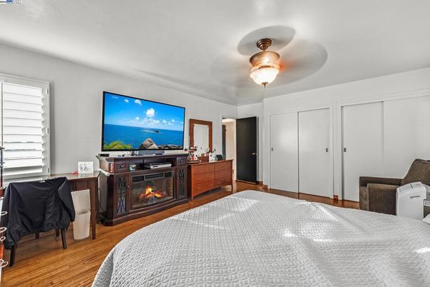 Bedroom, Fireplace, Interior, Water, Wood Texture Flooring