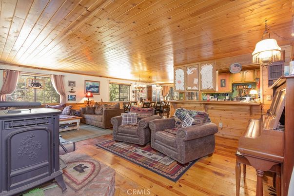 Chandelier, Dining room, Fireplace, Interior, Living room, Piano, Wooden Ceilings, Wood Texture Flooring