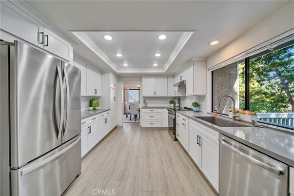 Interior, Kitchen, Recessed Lighting, Stainless Steel Appliances, Wood Texture Flooring