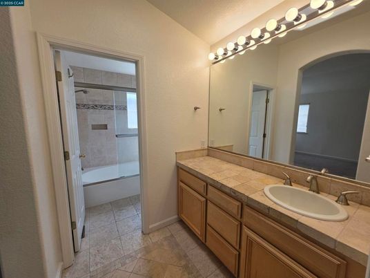 Bathroom, Dual Sink Vanities, Glass Shower, Interior, Tile Countertops