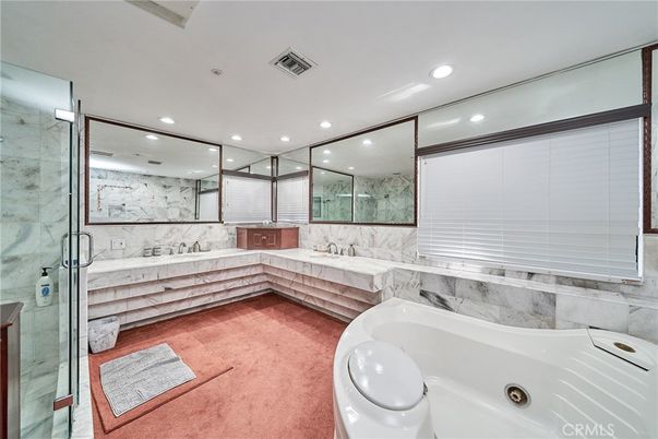 Bathroom, Dual Sink Vanities, Glass Shower, Interior, Marble Walls, Recessed Lighting