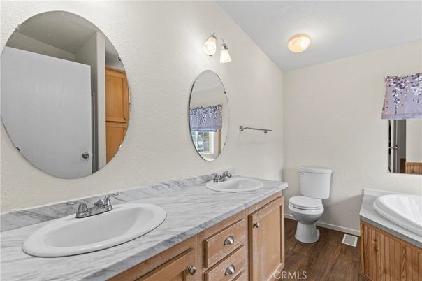Bathroom, Dual Sink Vanities, Interior, Tile Countertops, Wood Texture Flooring