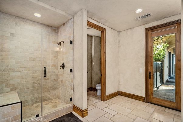 Bathroom, Glass Shower, Interior, Recessed Lighting, Stone Walls