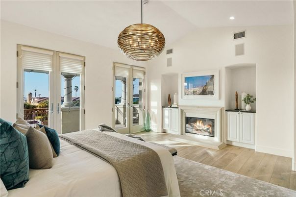 Bedroom, Chandelier, Fireplace, Interior, Pendant Lights, Recessed Lighting, Wood Texture Flooring