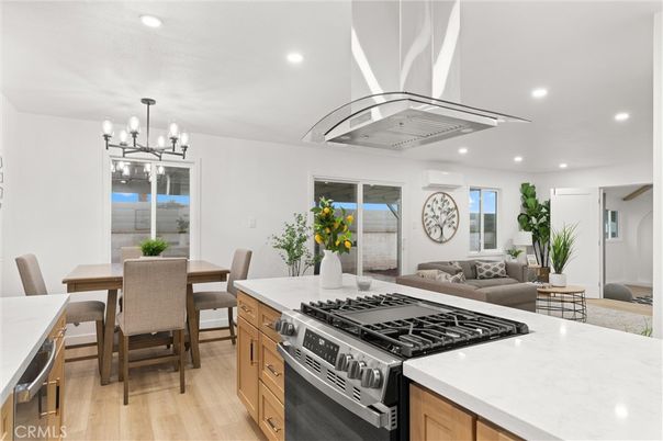 Chandelier, Dining room, Interior, Kitchen, Living room, Recessed Lighting, Stainless Steel Appliances, Wood Texture Flooring