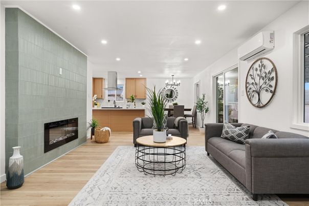 Chandelier, Dining room, Fireplace, Interior, Kitchen, Living room, Pendant Lights, Recessed Lighting, Wood Texture Flooring