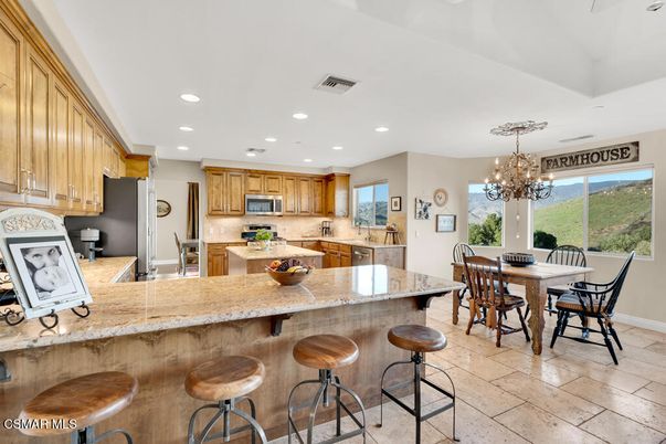 Chandelier, Dining room, Interior, Kitchen, Recessed Lighting, Stainless Steel Appliances