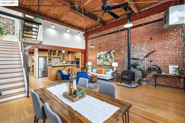 Dining room, Fireplace, Interior, Kitchen, Living room, Pendant Lights, Stainless Steel Appliances, Stone Walls, Wooden Beams, Wooden Ceilings, Wood Texture Flooring
