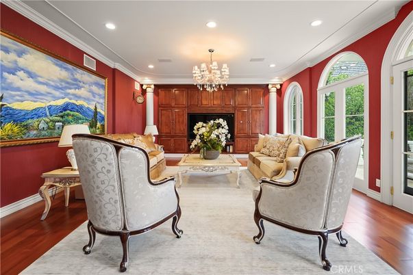 Chandelier, Fireplace, Interior, Living room, Recessed Lighting, Wood Texture Flooring