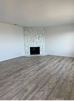 Empty room, Fireplace, Interior, Stone Walls, Wood Texture Flooring