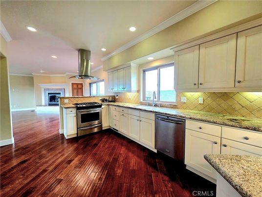 Fireplace, Interior, Kitchen, Recessed Lighting, Stainless Steel Appliances, Wood Texture Flooring