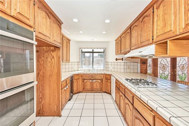 Interior, Kitchen, Recessed Lighting, Tile Countertops