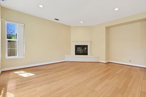 Empty room, Fireplace, Interior, Recessed Lighting, Wood Texture Flooring